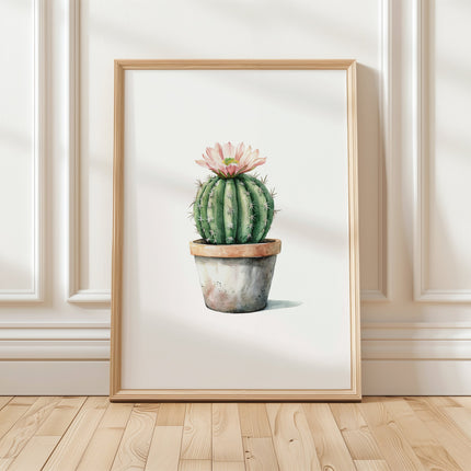 Delicate watercolor cactus in sage green with blush pink flower against white background, featuring minimalist Scandinavian design for calm, serene spaces.