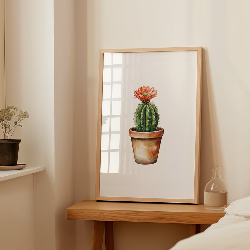 Hand-painted watercolor cactus with vibrant coral flower against white background, featuring earthy terracotta and sage green tones in a minimalist, calming composition perfect for bohemian spaces.