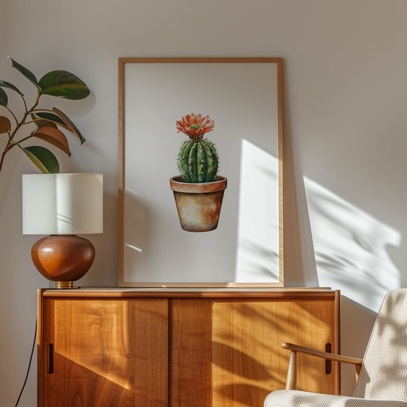 Hand-painted watercolor cactus with vibrant coral flower against white background, featuring earthy terracotta and sage green tones in a minimalist, calming composition perfect for bohemian spaces.