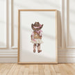 Whimsical watercolor cowgirl illustration in earthy browns, soft pinks, and cream, featuring intricately designed cowboy hat and boots with delicate floral accents, perfect for country-themed nurseries.
