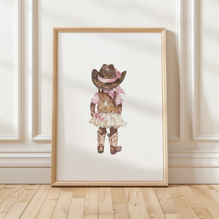 Whimsical watercolor cowgirl illustration in earthy browns, soft pinks, and cream, featuring intricately designed cowboy hat and boots with delicate floral accents, perfect for country-themed nurseries.