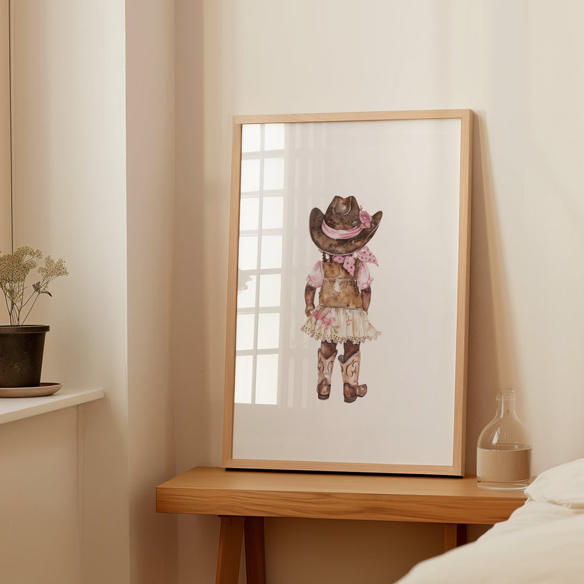 Whimsical watercolor cowgirl illustration in earthy browns, soft pinks, and cream, featuring intricately designed cowboy hat and boots with delicate floral accents, perfect for country-themed nurseries.