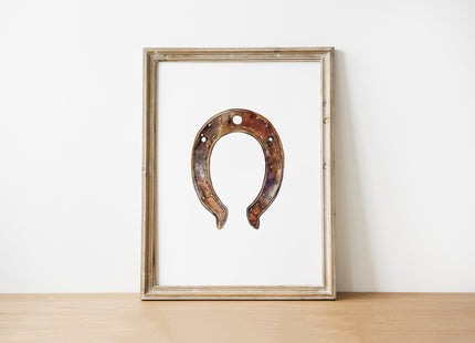 Vintage-style watercolor horseshoe in rust and copper tones against white background, featuring weathered patina details and minimalist design that conveys luck and stability for farmhouse spaces.