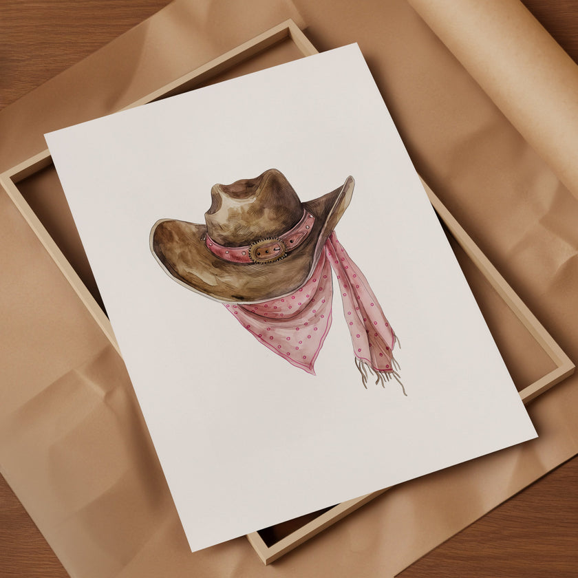 Rustic watercolor cowboy hat with pink polka dot bandana against white background, featuring detailed brushstrokes and soft muted colors perfect for farmhouse and western-themed spaces.