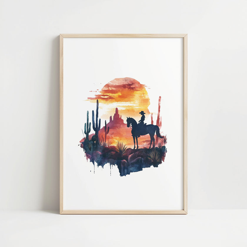Silhouetted cowboy on horseback against vibrant orange and red sunset with navy blue mountains, cacti and desert formations creating a powerful rustic southwestern aesthetic.