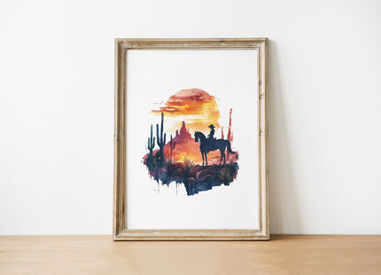 Silhouetted cowboy on horseback against vibrant orange and red sunset with navy blue mountains, cacti and desert formations creating a powerful rustic southwestern aesthetic.