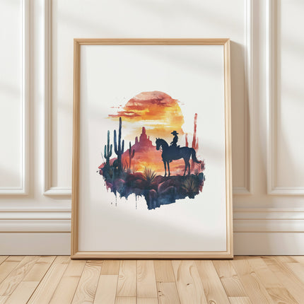 Silhouetted cowboy on horseback against vibrant orange and red sunset with navy blue mountains, cacti and desert formations creating a powerful rustic southwestern aesthetic.
