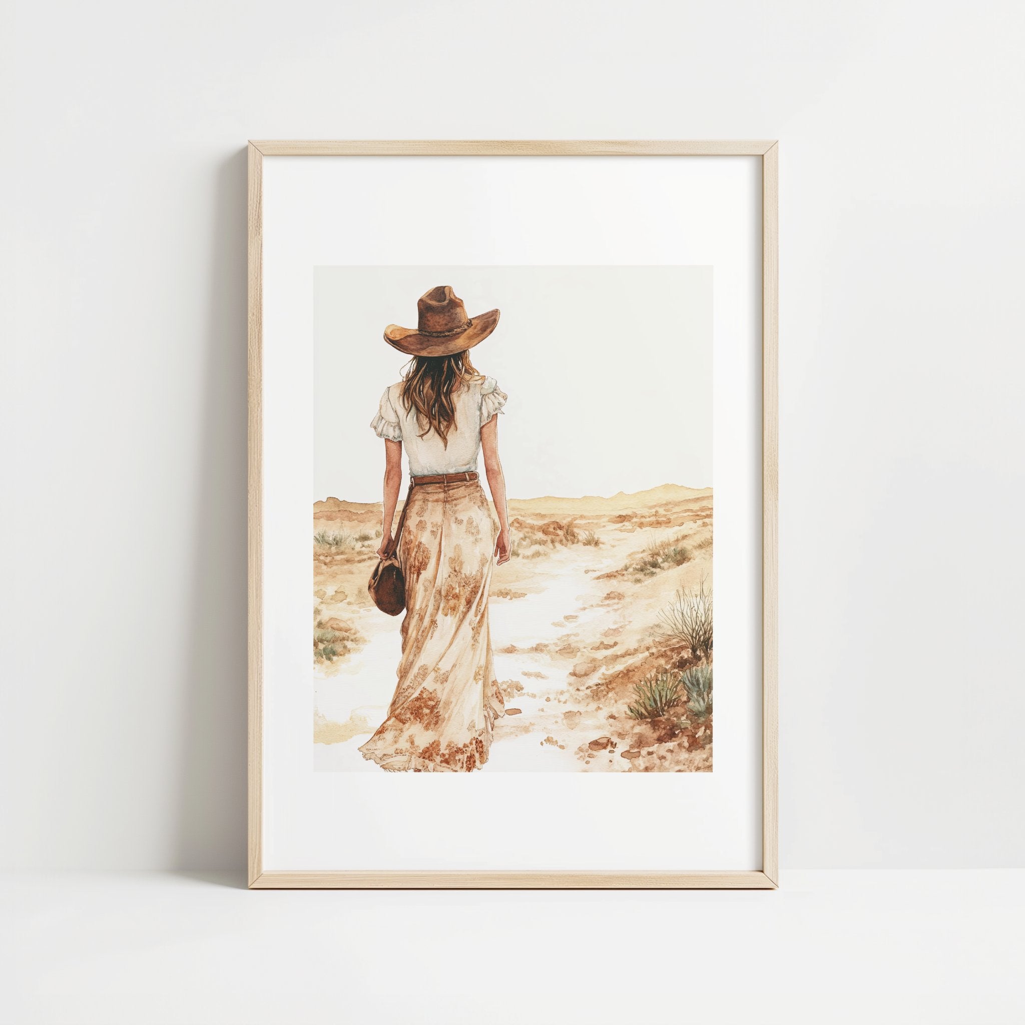 Serene vintage illustration of a solitary woman in wide-brimmed hat walking through desert landscape, rendered in soft sepia tones and sandy beige with minimalist sage green accents.