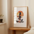 Modern silhouette print featuring a cowboy and dog against a warm terracotta sunset, rendered in orange and earthy brown tones with clean, bold contours creating a peaceful, introspective mood.