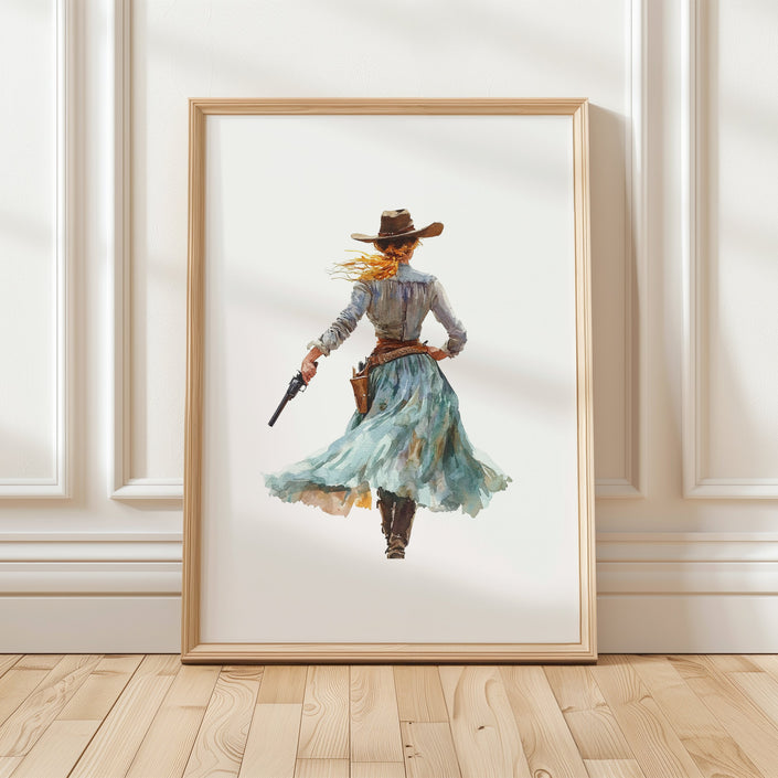 Watercolor cowgirl drawing a revolver in teal, sand, and cinnamon tones against white background, conveying motion and independence with flowing skirt and hat, perfect for modern farmhouse decor.