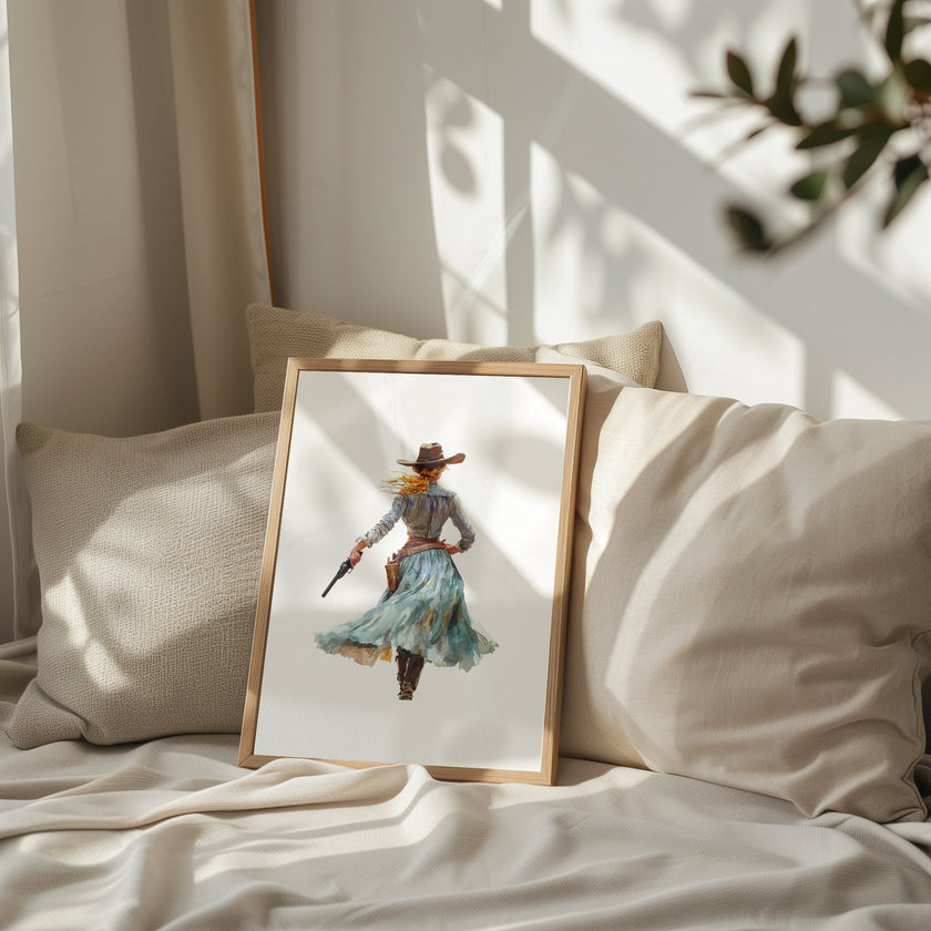 Watercolor cowgirl drawing a revolver in teal, sand, and cinnamon tones against white background, conveying motion and independence with flowing skirt and hat, perfect for modern farmhouse decor.