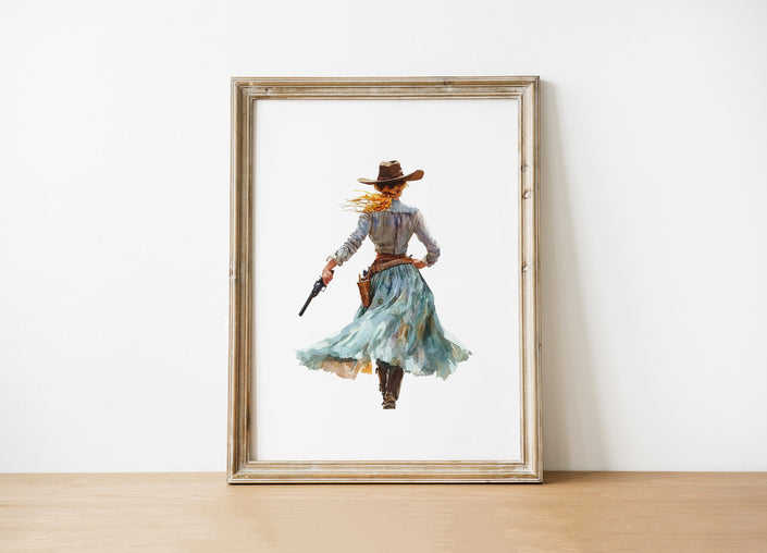 Watercolor cowgirl drawing a revolver in teal, sand, and cinnamon tones against white background, conveying motion and independence with flowing skirt and hat, perfect for modern farmhouse decor.