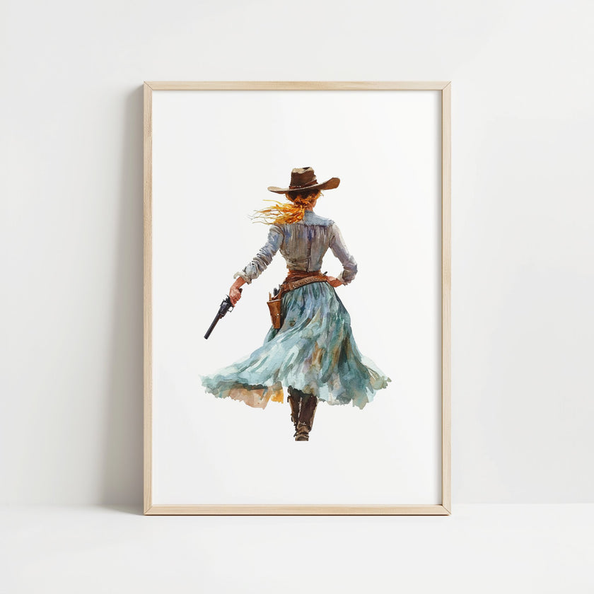 Watercolor cowgirl drawing a revolver in teal, sand, and cinnamon tones against white background, conveying motion and independence with flowing skirt and hat, perfect for modern farmhouse decor.