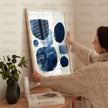 Abstract geometric navy blue and indigo shapes against white background with soft textures creating a calming modern minimalist design perfect for contemporary spaces.