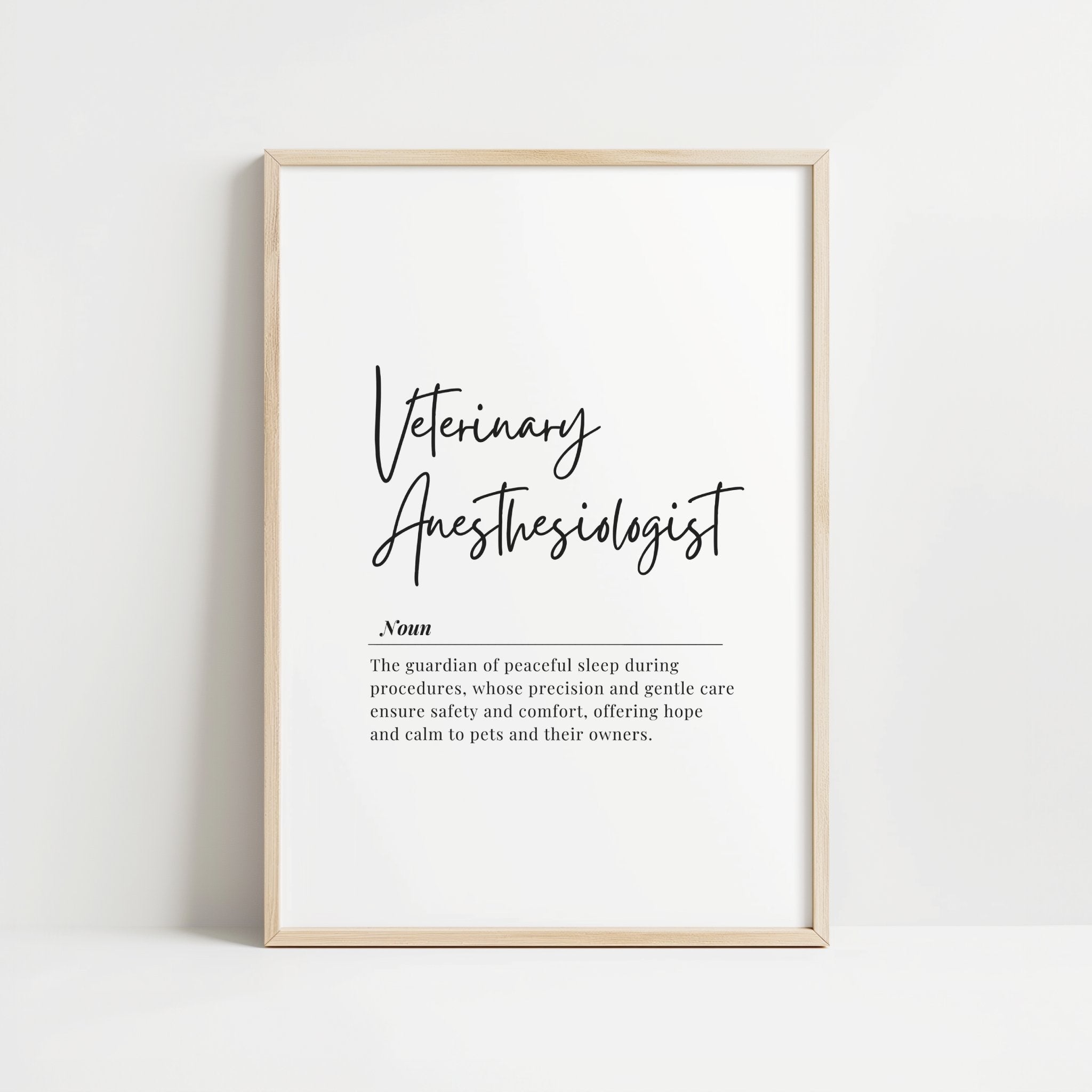 Elegant black script 'Veterinary Anesthesiologist' with flowing definition text against white background in wooden frame, creating a sophisticated professional tribute to veterinary specialists.