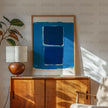 Modern abstract digital print featuring overlapping dark blue rectangles with vibrant azure and cobalt tones against textured white background, creating a serene yet sophisticated geometric composition.