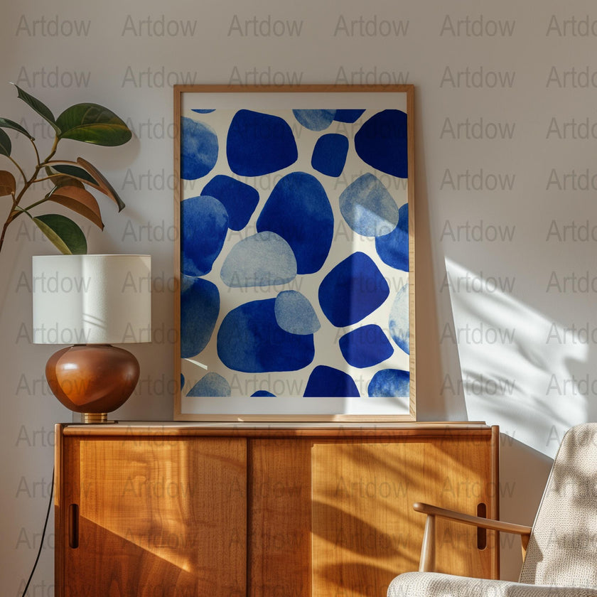 Modern abstract digital print featuring organic blue shapes with watercolor texture on white background, creating a calming, balanced composition perfect for minimalist Scandinavian interiors.