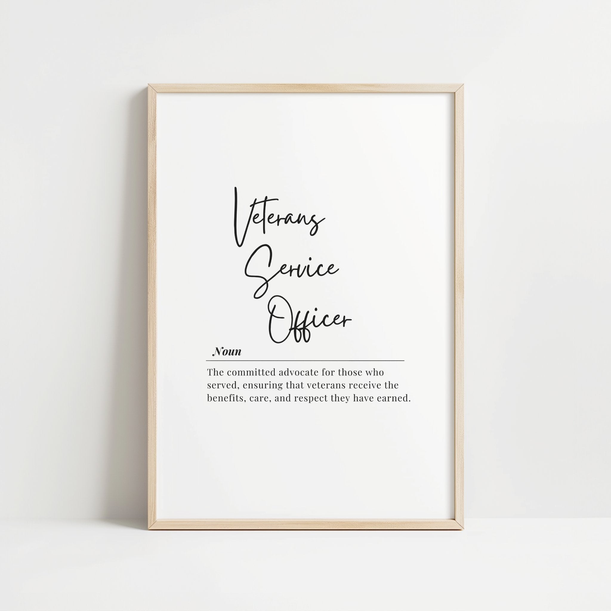 Monochromatic typography print defining 'Veterans Service Officer' in elegant script font against white background, with contrasting sans-serif text creating a professional, respectful atmosphere perfect for office display.