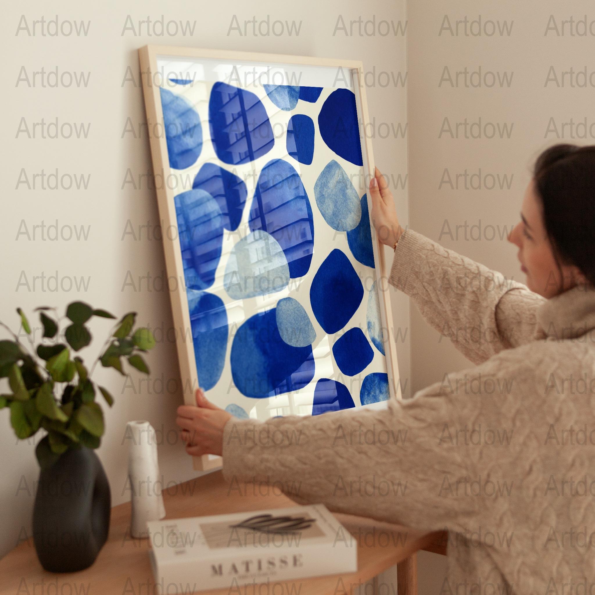 Modern abstract digital print featuring organic blue shapes with watercolor texture on white background, creating a calming, balanced composition perfect for minimalist Scandinavian interiors.